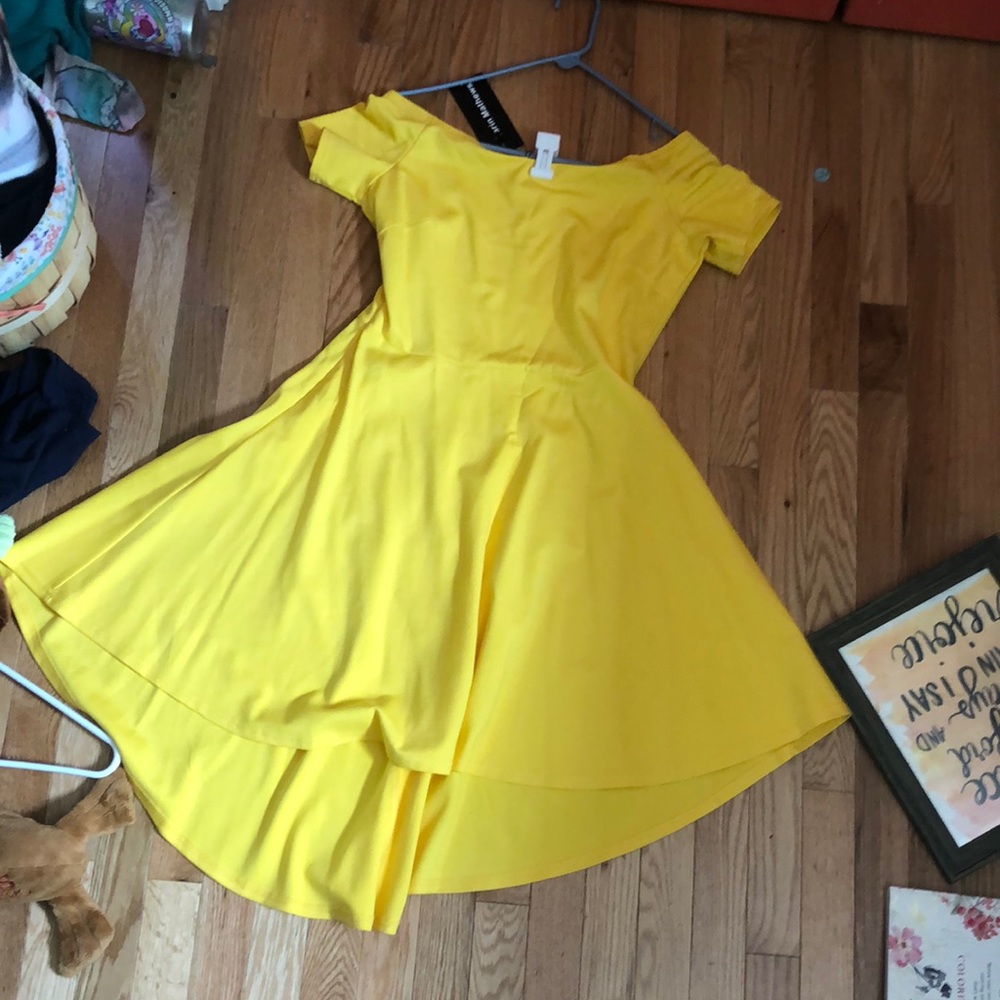 Yellow dress, longer in the back shorter in the front, still had tags